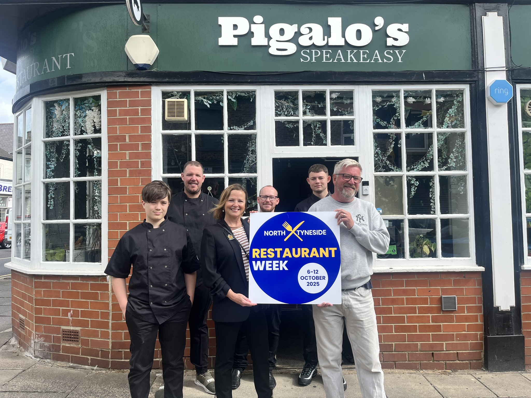 Elected Mayor Karen Clark with Pigalo restaurant staff holding 'North Tyneside Restaurant Week' banner