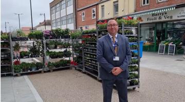 Business liaison officer Wayne Young on Bedford Street 